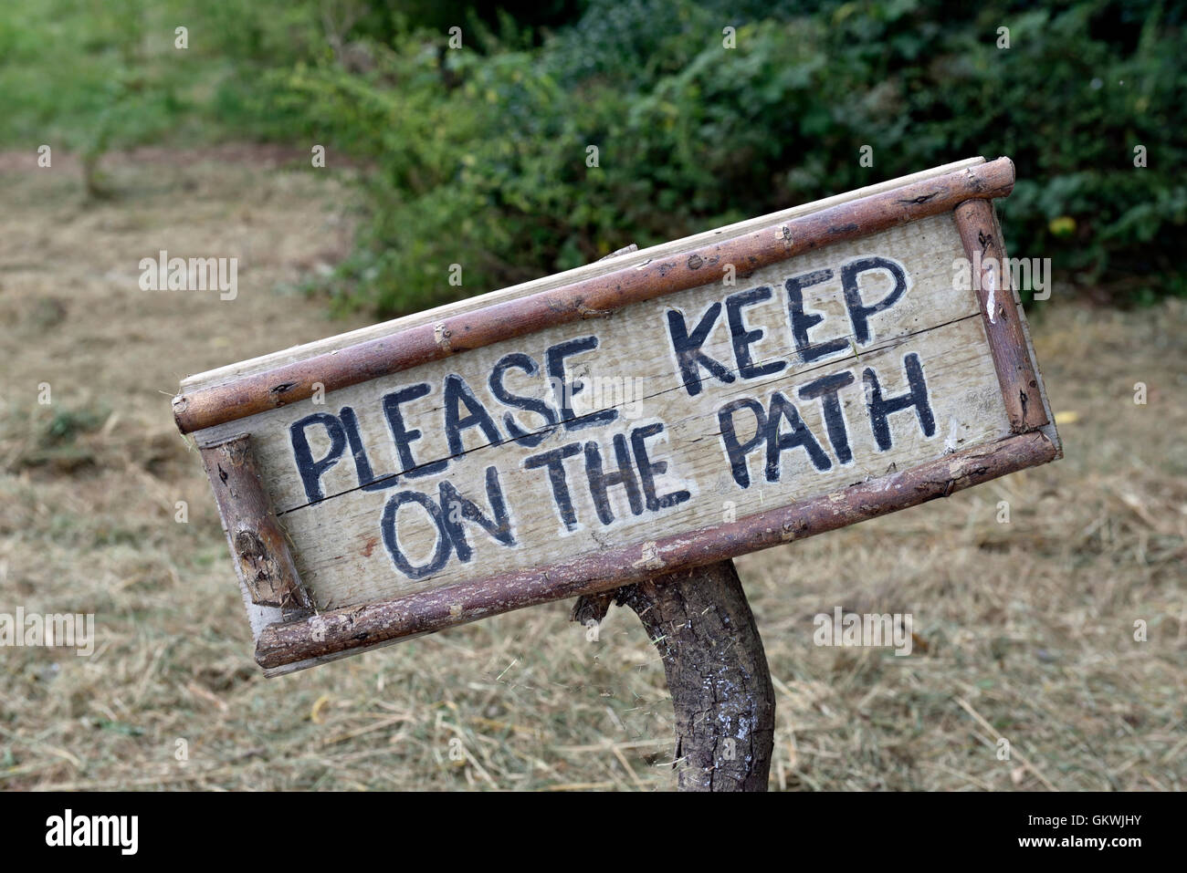 Wooden - please keep on the path -  sign, Woodberry Wetlands, Stoke Newington, London Borough of Hackney, England Britain UK Stock Photo