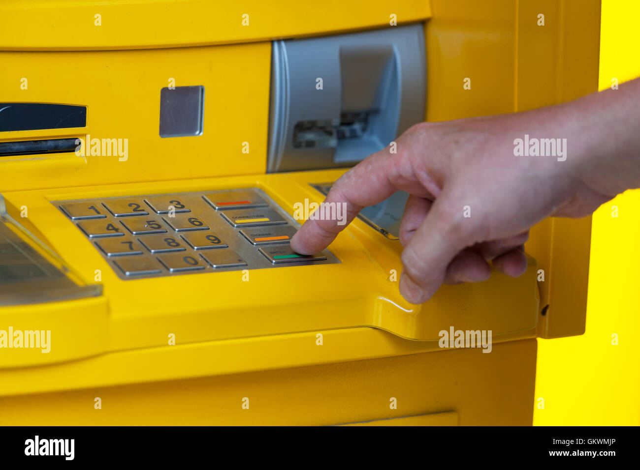 man enters a PIN code in the ATM Stock Photo - Alamy