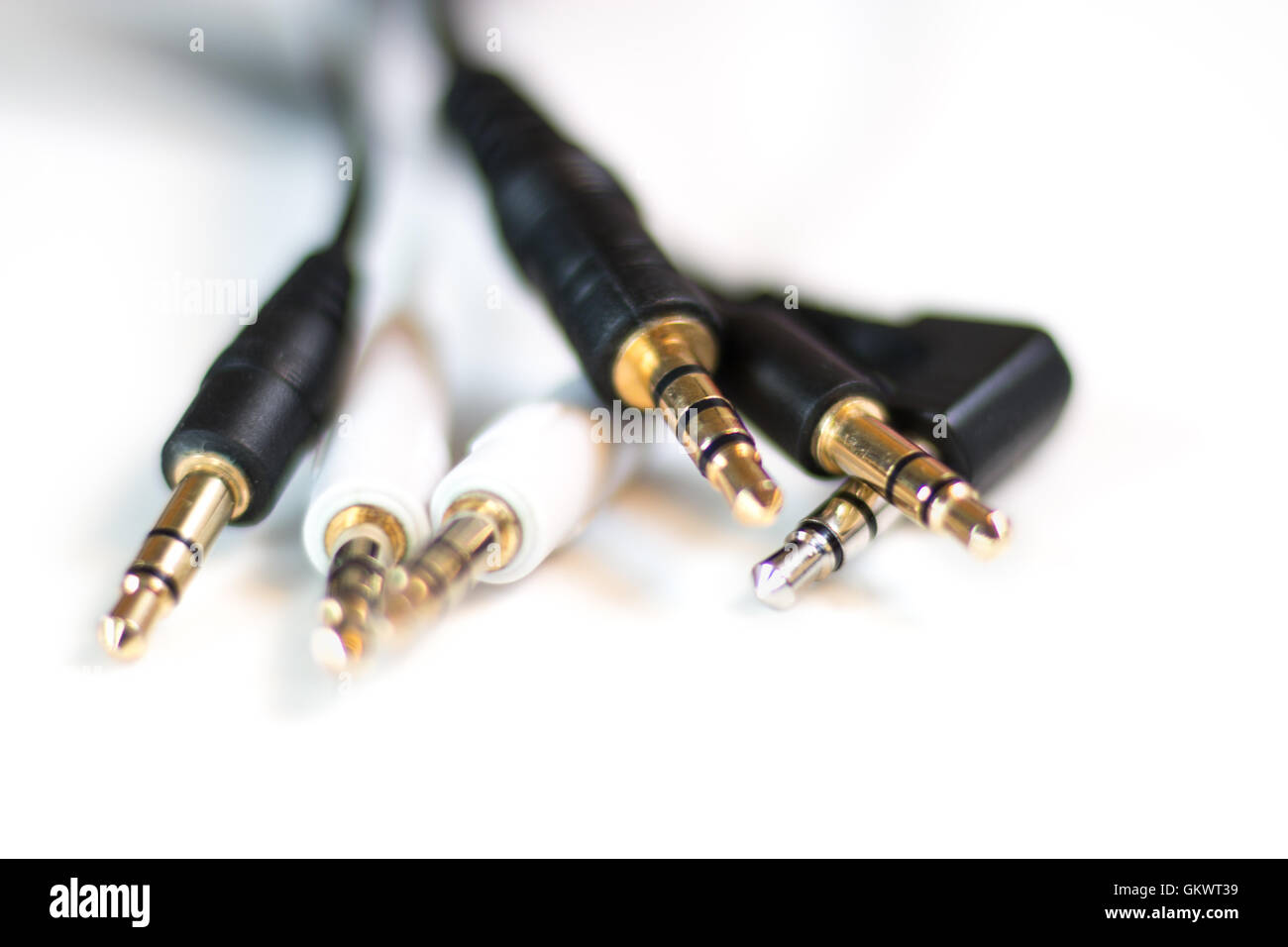 Group of audio leads showing the classic 3.5mm headphone plug Stock Photo