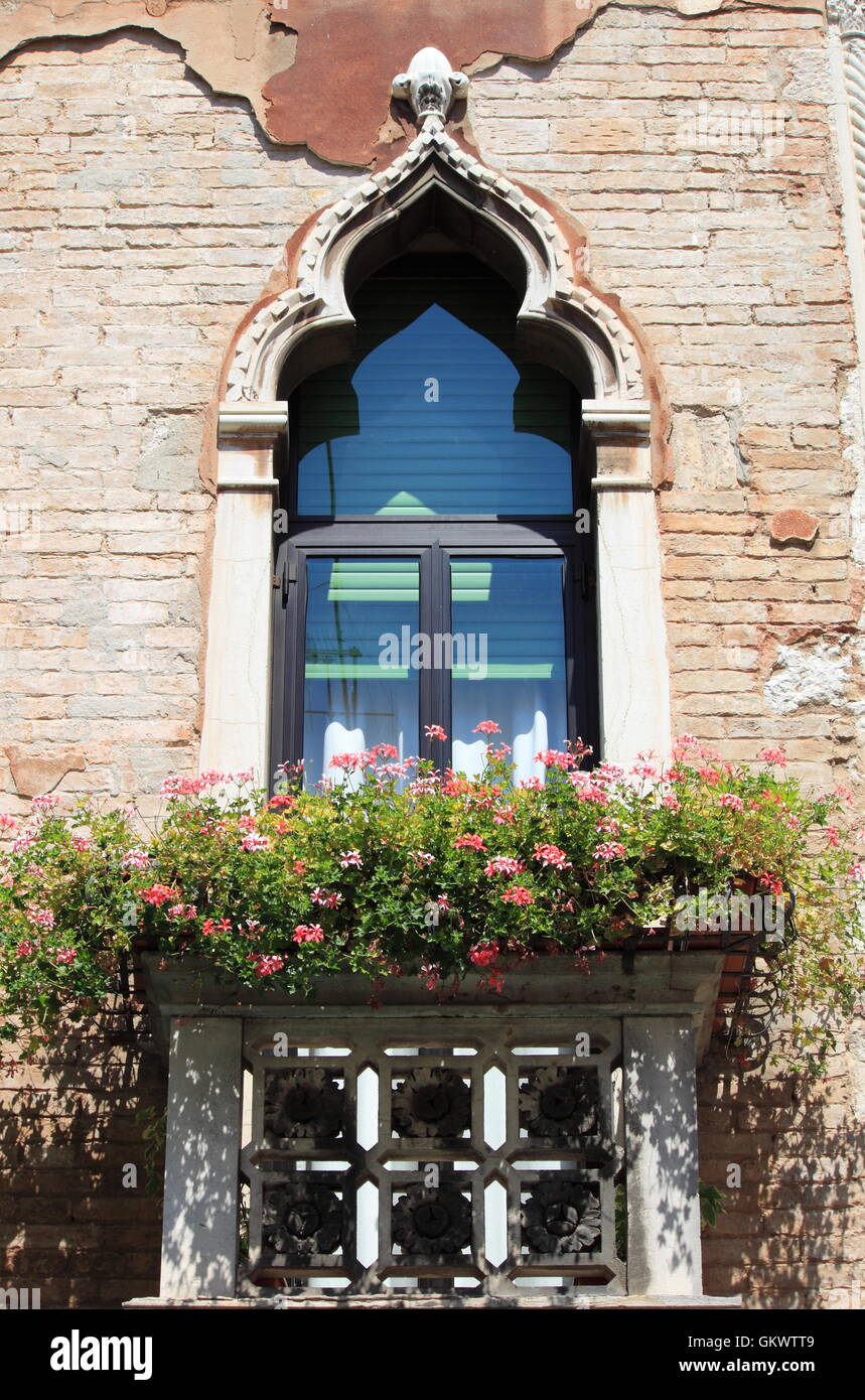 Typical renaissance window with balcony in Venice, Italy Stock Photo
