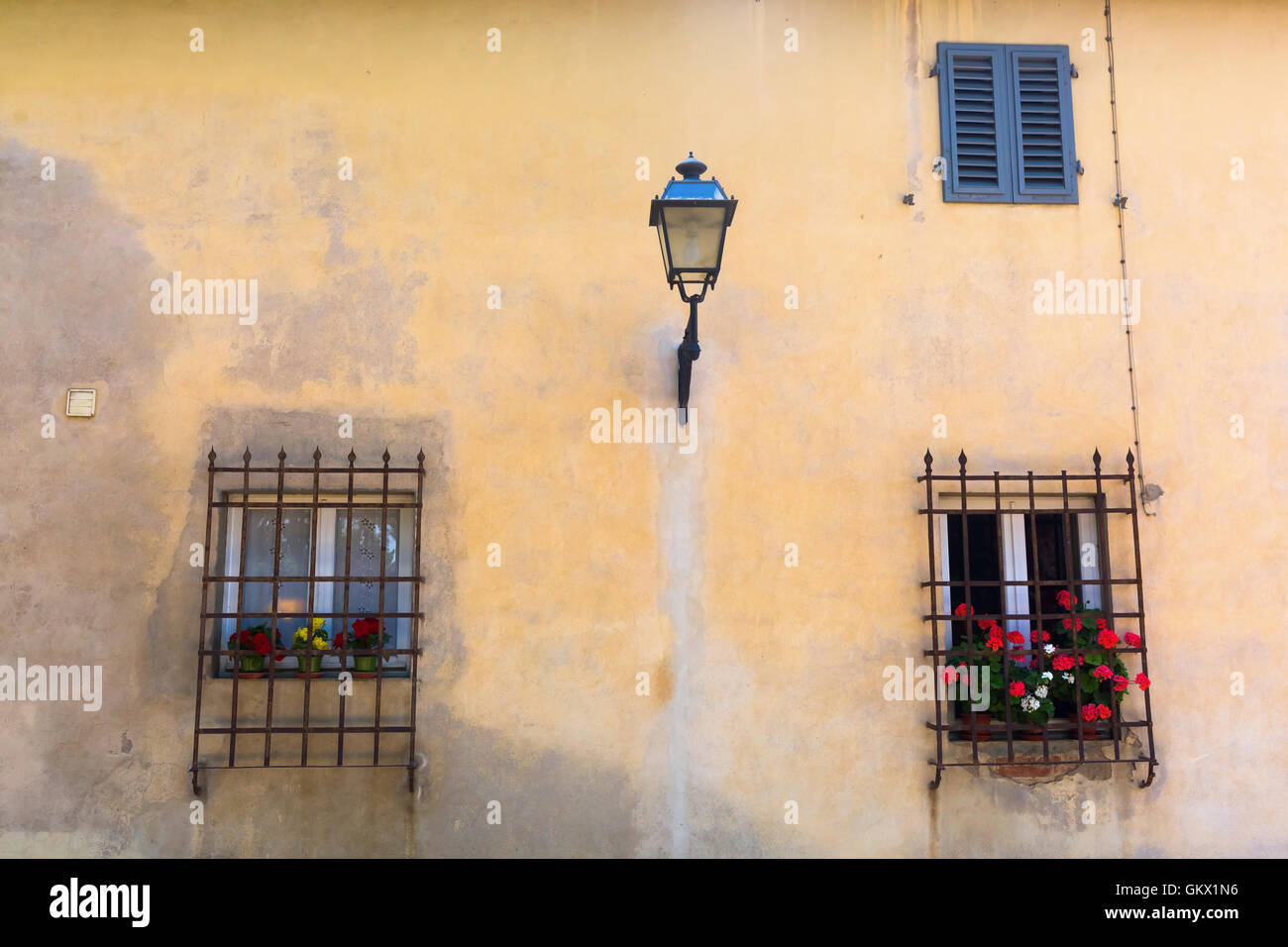 windows at an old house in an Italian town Stock Photo - Alamy