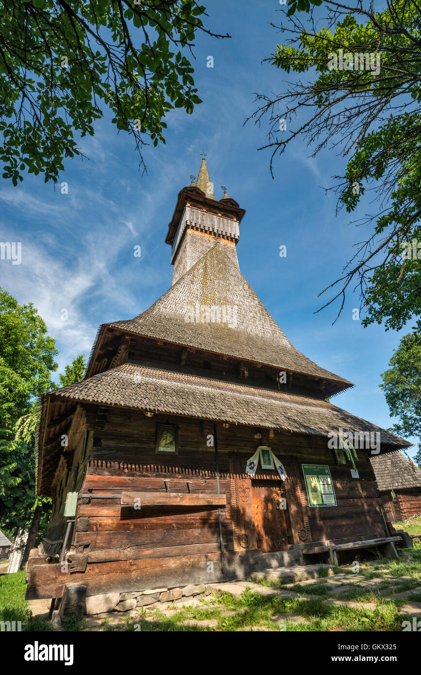 St Nicholas Church in Budesti Josani, wooden Romanian Orthodox Church, in village of Budesti, Maramures Region, Romania Stock Photo