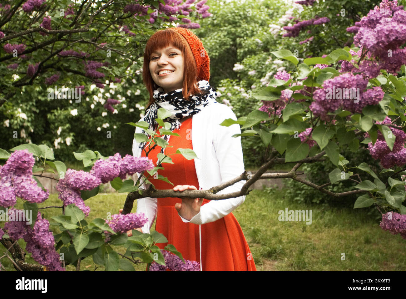 Portrait of a young beautiful girl in an orange knitted beret Stock ...