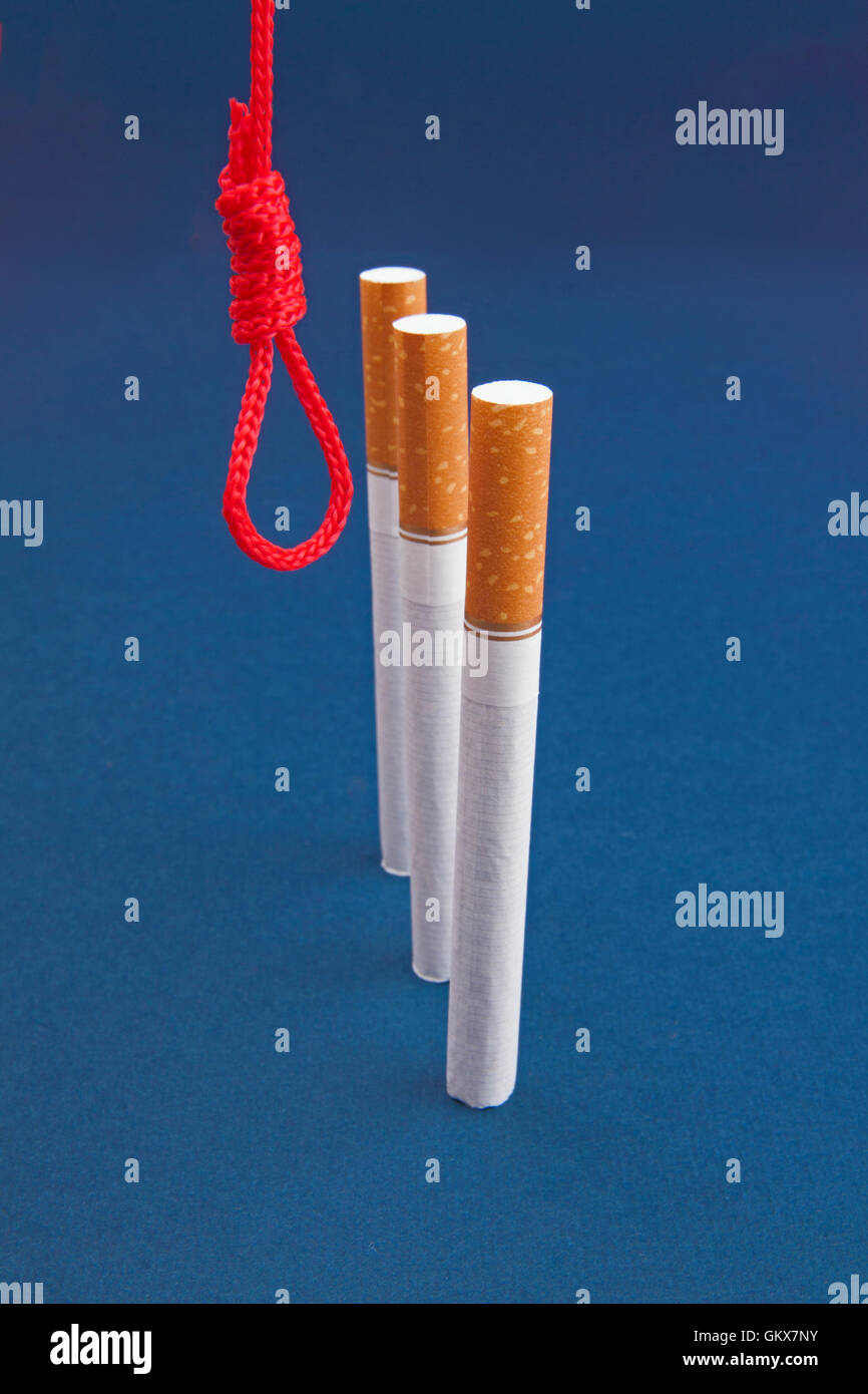 Cigarettes and hanging rope Stock Photo