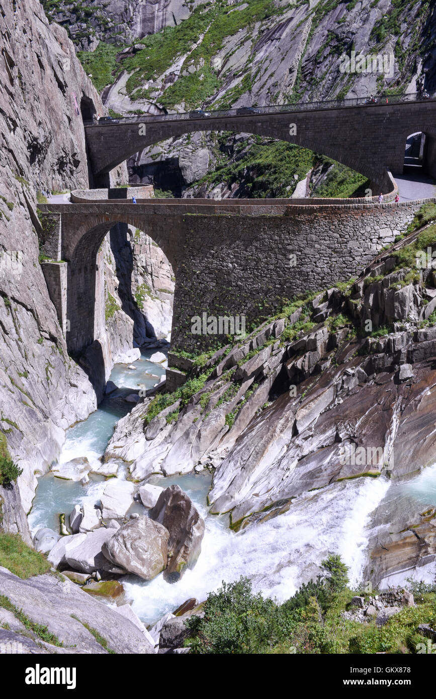Andermatt, Switzerland - 7 august 2016: people walking on Devil's bridge at St. Gotthard pass on the Swiss alps Stock Photo