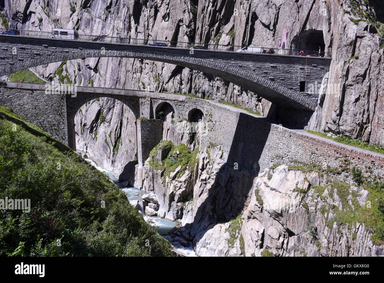 Andermatt, Switzerland - 7 august 2016: people walking on Devil's bridge at St. Gotthard pass on the Swiss alps Stock Photo