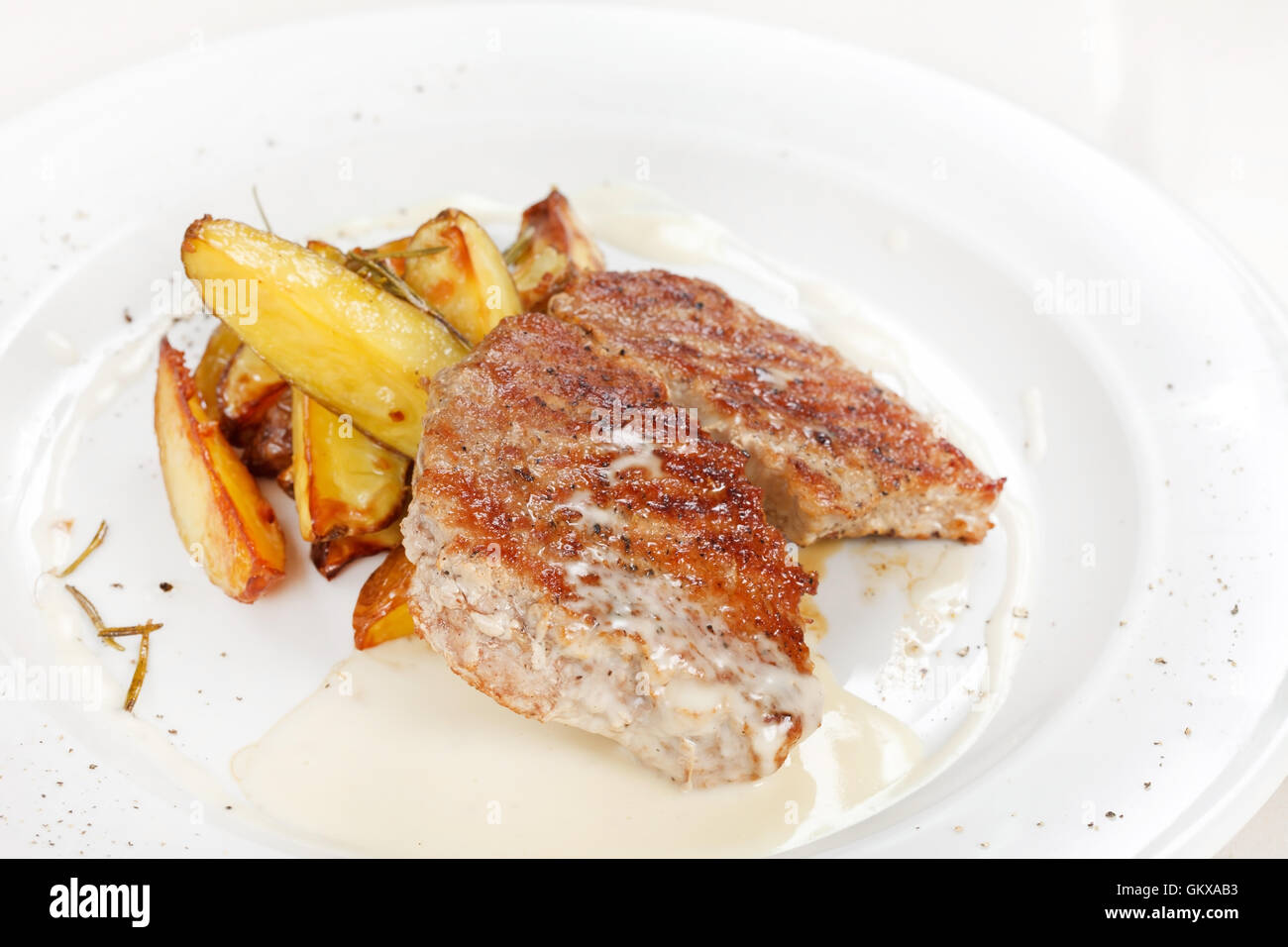 grilled steak with potatoes Stock Photo - Alamy