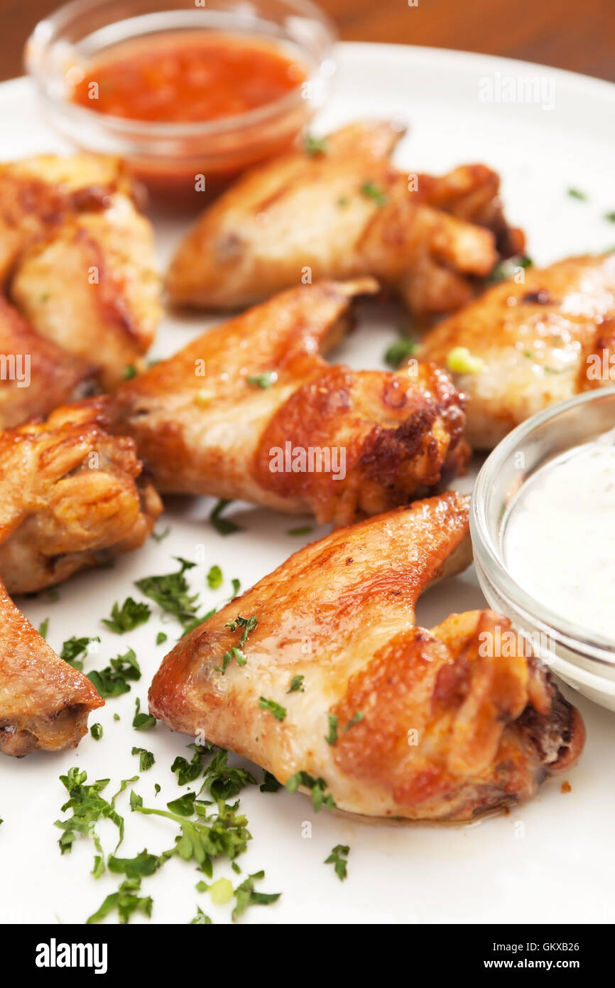 Chicken wings with sauce Stock Photo - Alamy