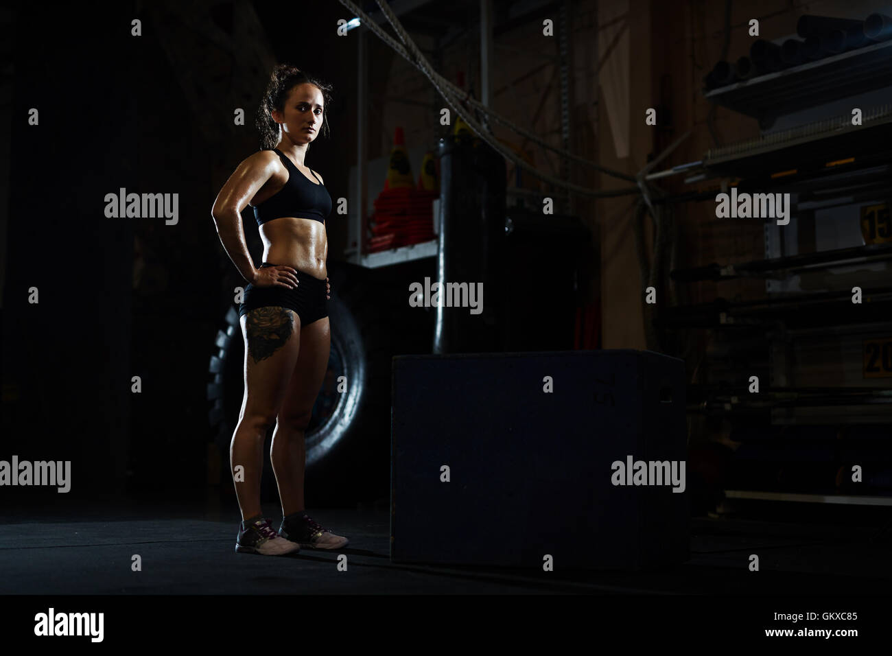 Woman standing in gym hi-res stock photography and images - Alamy