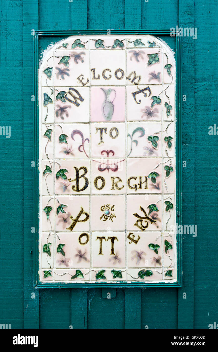 Tiled sign reading Welcome to Borgh Pottery on the Isle of Lewis in the Outer Hebrides. Stock Photo