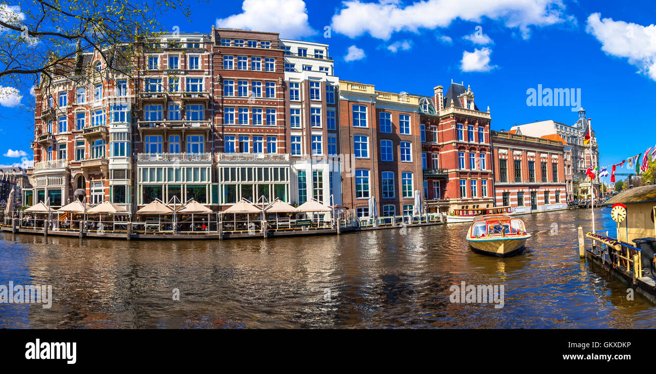 eautiful romantic canals of Amsterdam. Holland Stock Photo