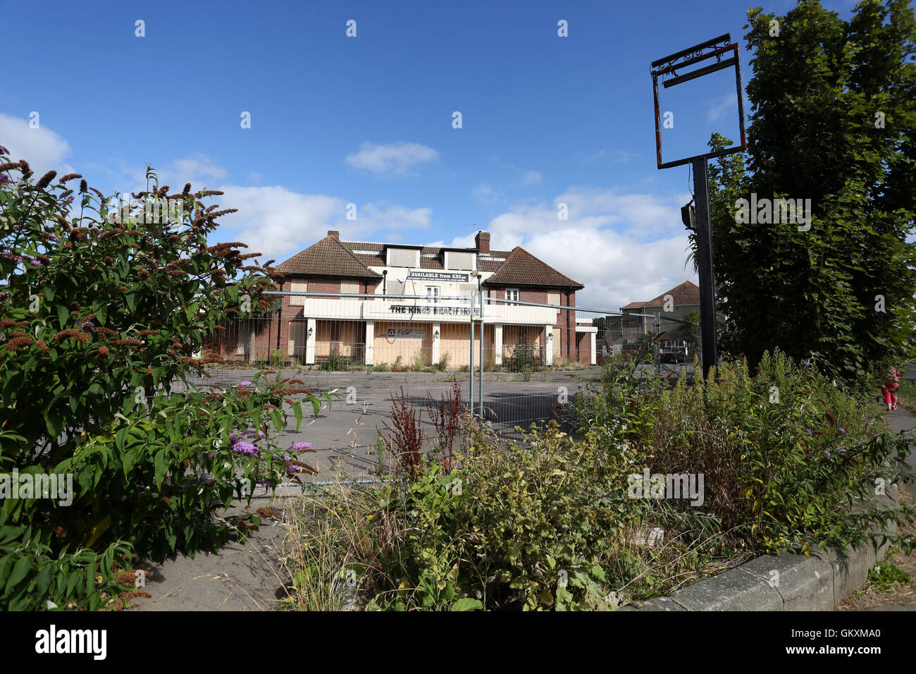 The King's Beach Hotel and pub pictured closed and in disrepair. Pagham, West Sussex, UK. Stock Photo