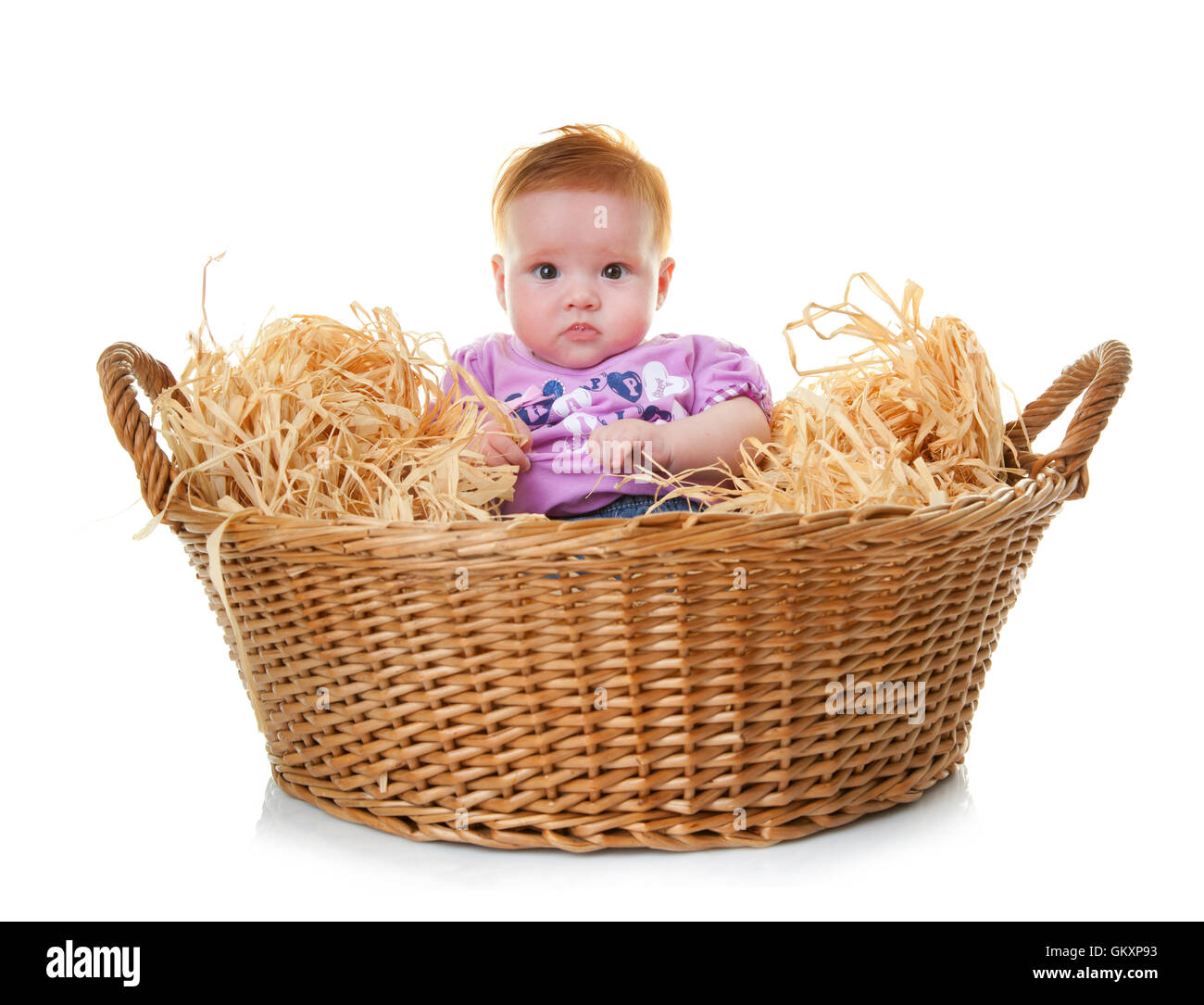 Cute baby in basket on white background Stock Photo Alamy