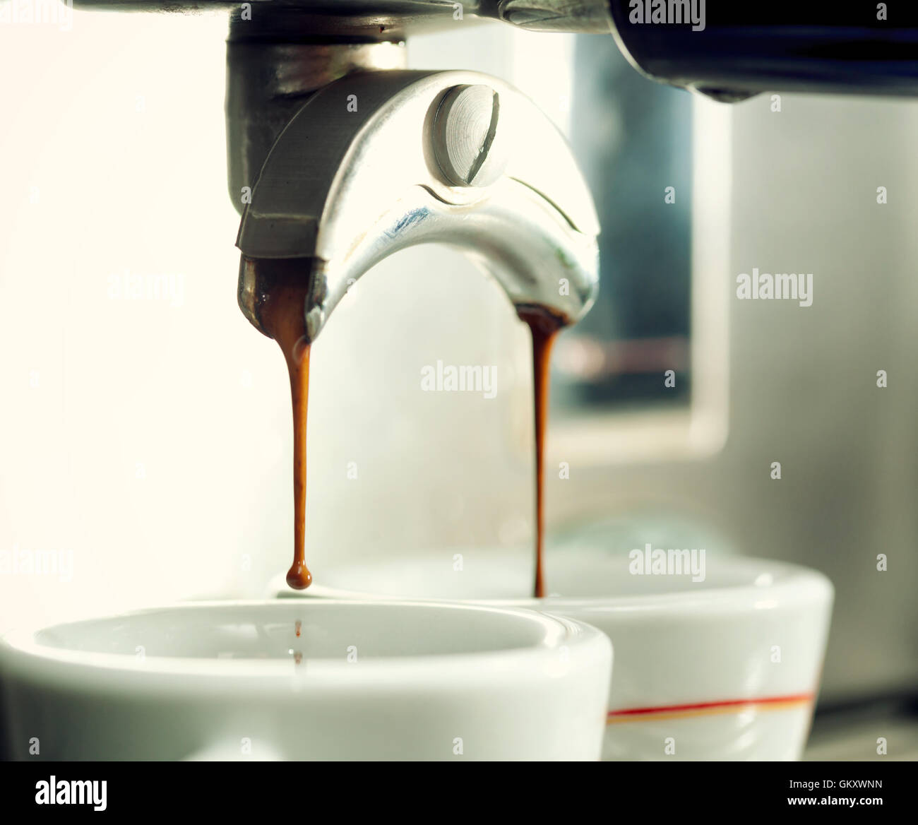 https://c8.alamy.com/comp/GKXWNN/close-up-of-an-espresso-machine-making-a-cup-of-coffee-GKXWNN.jpg