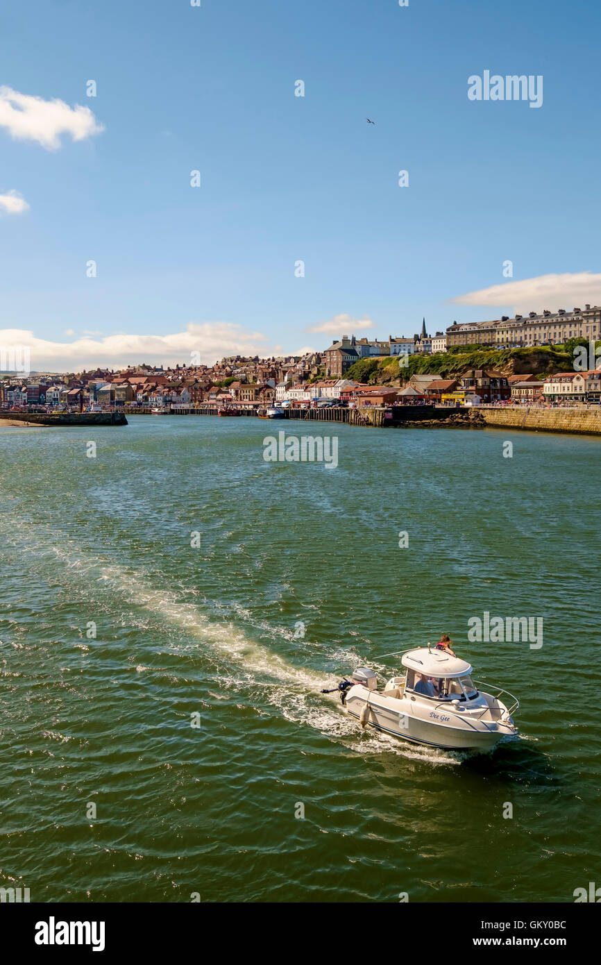 A pleasure boat in Whitby harbour, North Yorkshire, England Stock Photo
