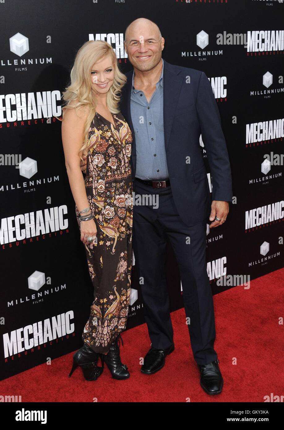 Hollywood, CA. 22nd Aug, 2016. Randy Couture, Mindy Robinson at arrivals for MECHANIC: RESURRECTION Premiere, Arclight Cinemas Hollywood, Hollywood, CA August 22, 2016. Credit:  Dee Cercone/Everett Collection/Alamy Live News Stock Photo