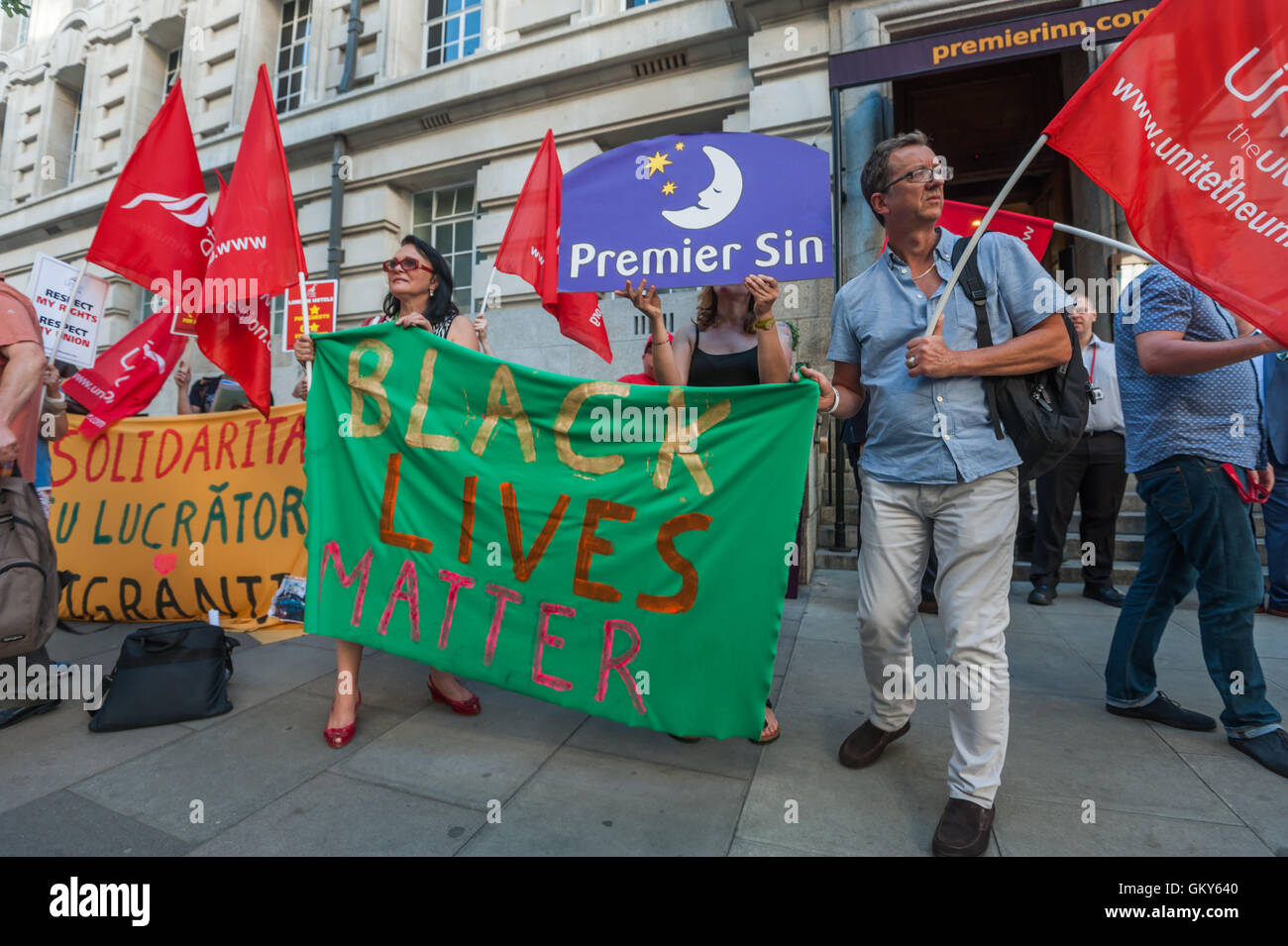 London, UK. August 23rd 2016. Unite Hospitality Workers launch their 'Unethical London' report into the bullying, harassment and victimisation of workers in London's top hotels, where management deny the right to join unions and bargain for better wages and conditions with a protest outside the Premier Inn at London County Hall. Two thirds of hospitality workers earn less than the London Living Wage. Peter Marshall/Alamy Live News Stock Photo