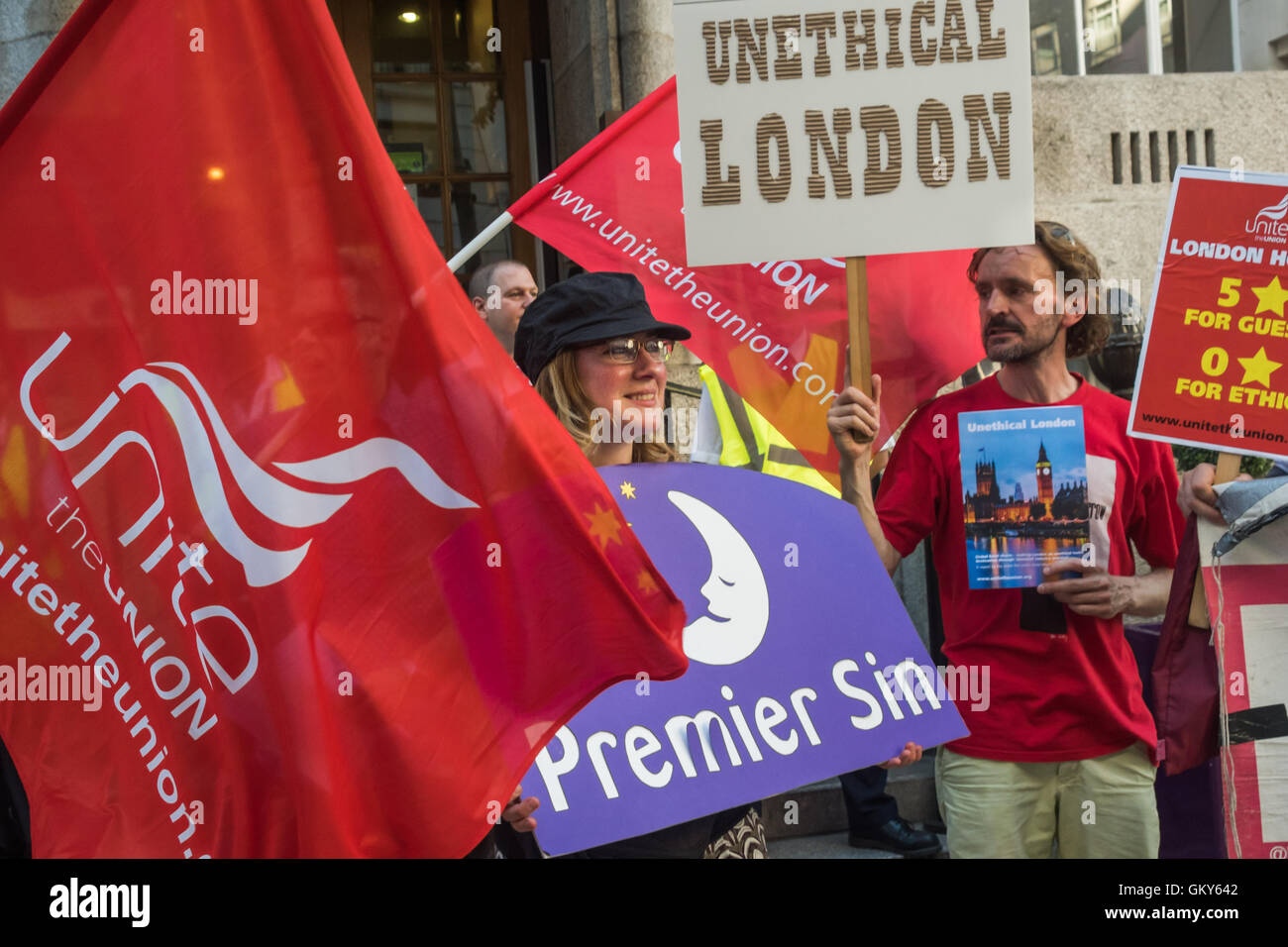 London, UK. August 23rd 2016. Unite Hospitality Workers launch their 'Unethical London' report into the bullying, harassment and victimisation of workers in London's top hotels, where management deny the right to join unions and bargain for better wages and conditions with a protest outside the Premier Inn at London County Hall. Two thirds of hospitality workers earn less than the London Living Wage. Peter Marshall/Alamy Live News Stock Photo