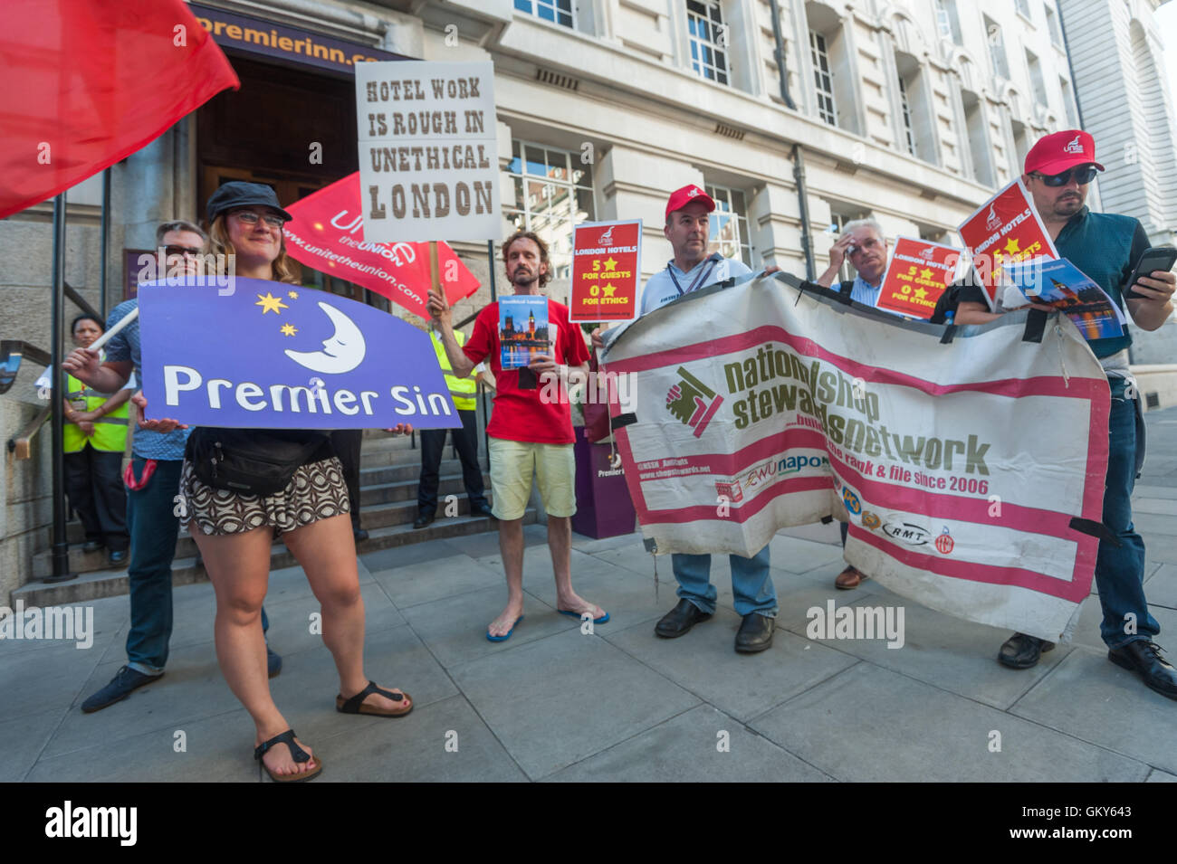 London, UK. August 23rd 2016. Unite Hospitality Workers launch their 'Unethical London' report into the bullying, harassment and victimisation of workers in London's top hotels, where management deny the right to join unions and bargain for better wages and conditions with a protest outside the Premier Inn at London County Hall. Two thirds of hospitality workers earn less than the London Living Wage. Peter Marshall/Alamy Live News Stock Photo