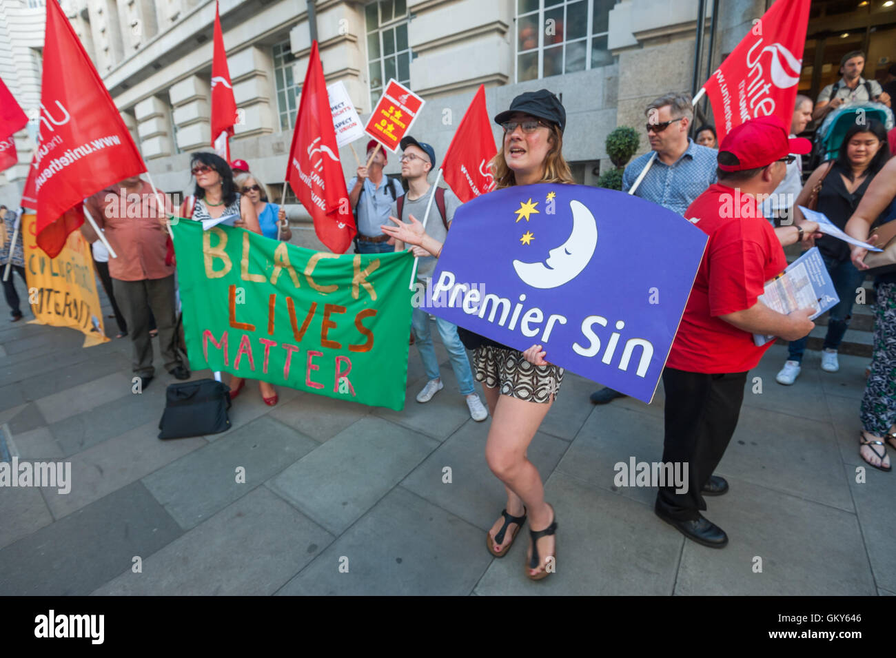 London, UK. August 23rd 2016. Unite Hospitality Workers launch their 'Unethical London' report into the bullying, harassment and victimisation of workers in London's top hotels, where management deny the right to join unions and bargain for better wages and conditions with a protest outside the Premier Inn at London County Hall. Two thirds of hospitality workers earn less than the London Living Wage. Peter Marshall/Alamy Live News Stock Photo