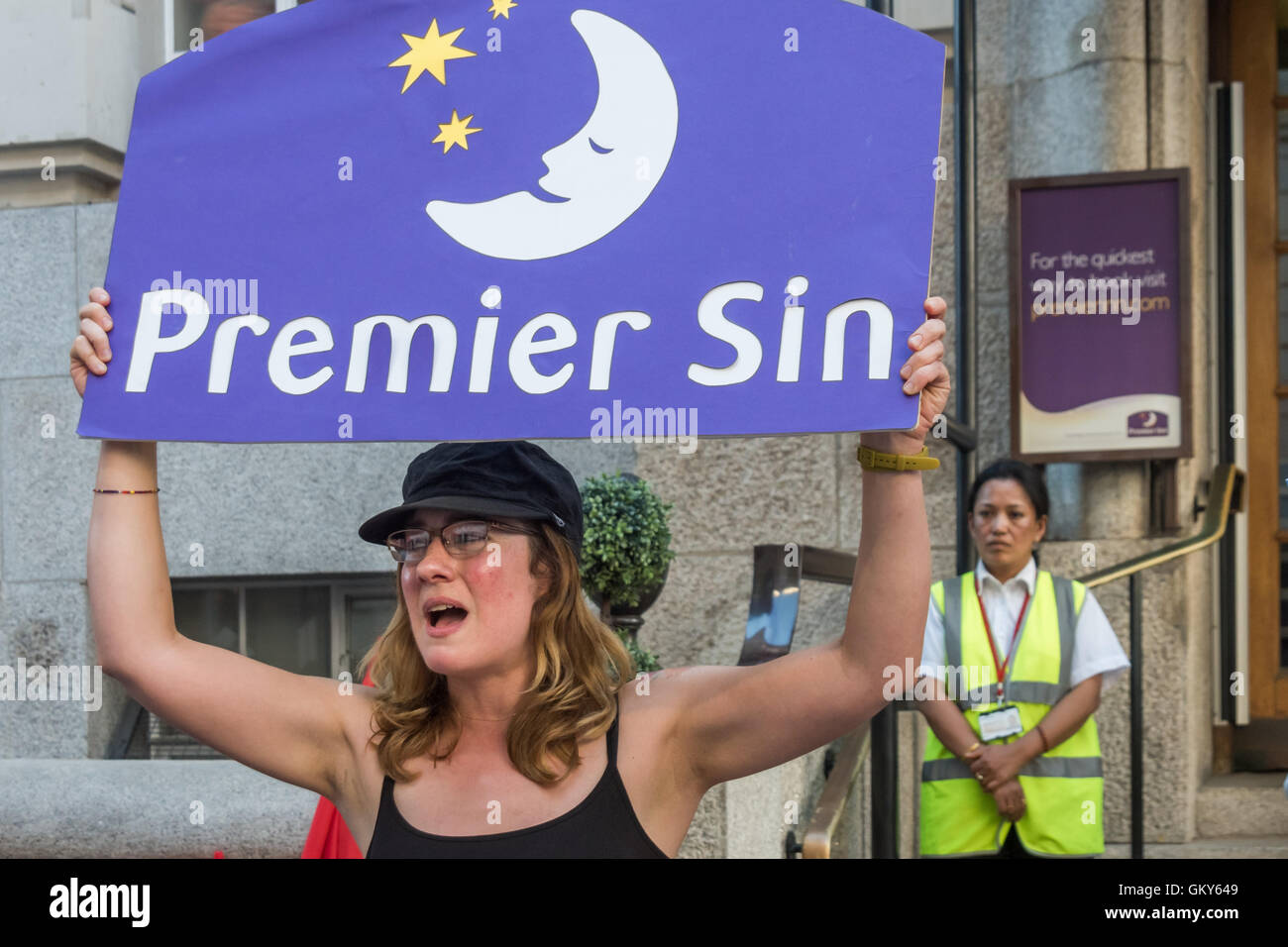 London, UK. August 23rd 2016. Unite Hospitality Workers launch their 'Unethical London' report into the bullying, harassment and victimisation of workers in London's top hotels, where management deny the right to join unions and bargain for better wages and conditions with a protest outside the Premier Inn at London County Hall. Two thirds of hospitality workers earn less than the London Living Wage. Peter Marshall/Alamy Live News Stock Photo