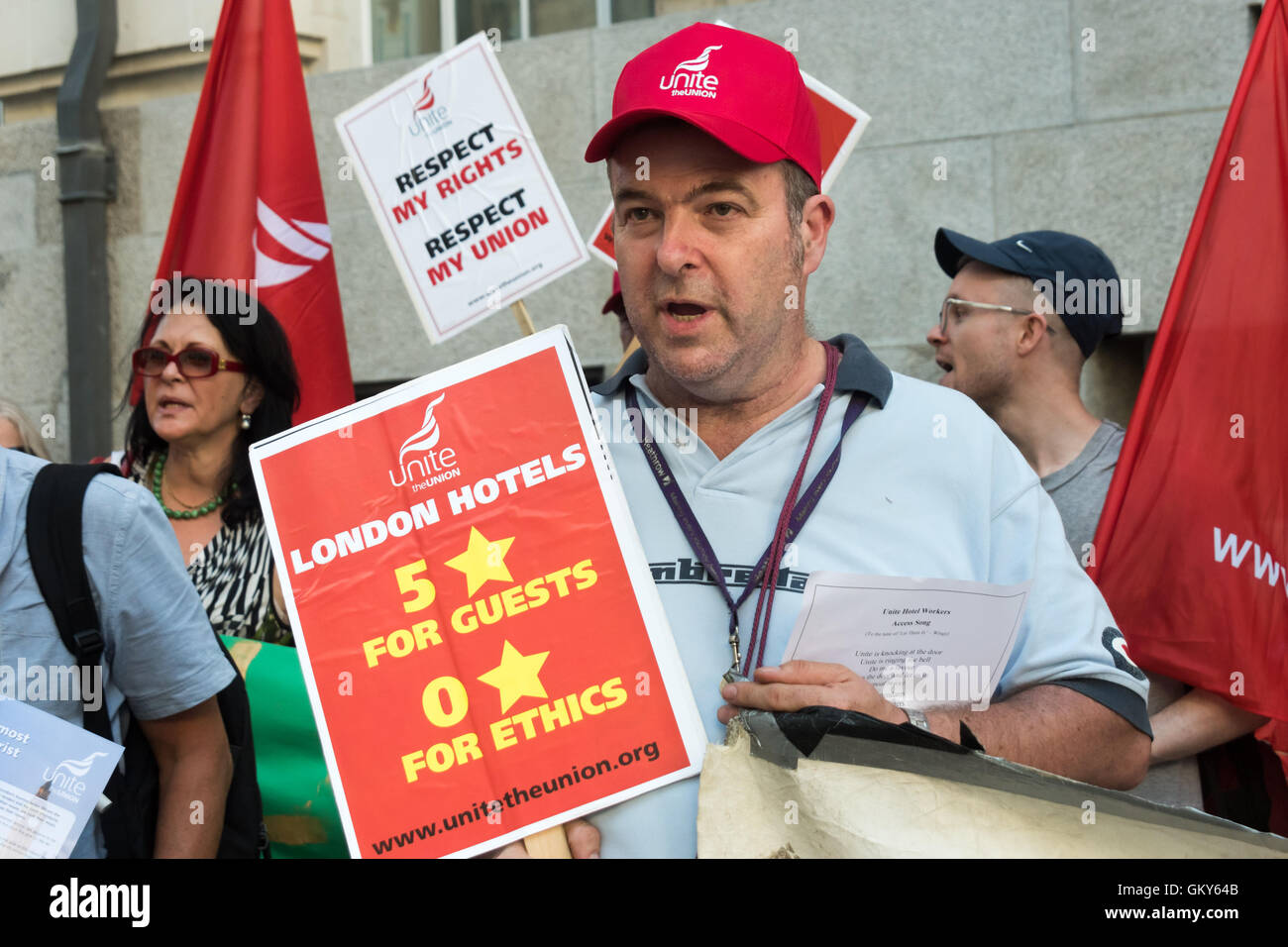 London, UK. August 23rd 2016. Unite Hospitality Workers launch their 'Unethical London' report into the bullying, harassment and victimisation of workers in London's top hotels, where management deny the right to join unions and bargain for better wages and conditions with a protest outside the Premier Inn at London County Hall. Two thirds of hospitality workers earn less than the London Living Wage. Peter Marshall/Alamy Live News Stock Photo