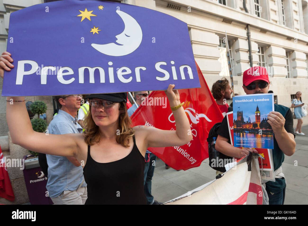 London, UK. August 23rd 2016. Unite Hospitality Workers launch their 'Unethical London' report into the bullying, harassment and victimisation of workers in London's top hotels, where management deny the right to join unions and bargain for better wages and conditions with a protest close to the London Eye and outside the Premier Inn at London County Hall. Two thirds of hospitality workers earn less than the London Living Wage. Peter Marshall/Alamy Live News Stock Photo