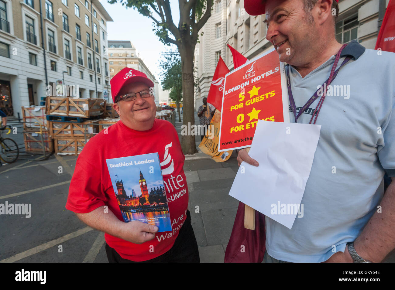 London, UK. August 23rd 2016. Unite Hospitality Workers launch their 'Unethical London' report into the bullying, harassment and victimisation of workers in London's top hotels, where management deny the right to join unions and bargain for better wages and conditions with a protest outside the Premier Inn at London County Hall. Two thirds of hospitality workers earn less than the London Living Wage. Peter Marshall/Alamy Live News Stock Photo