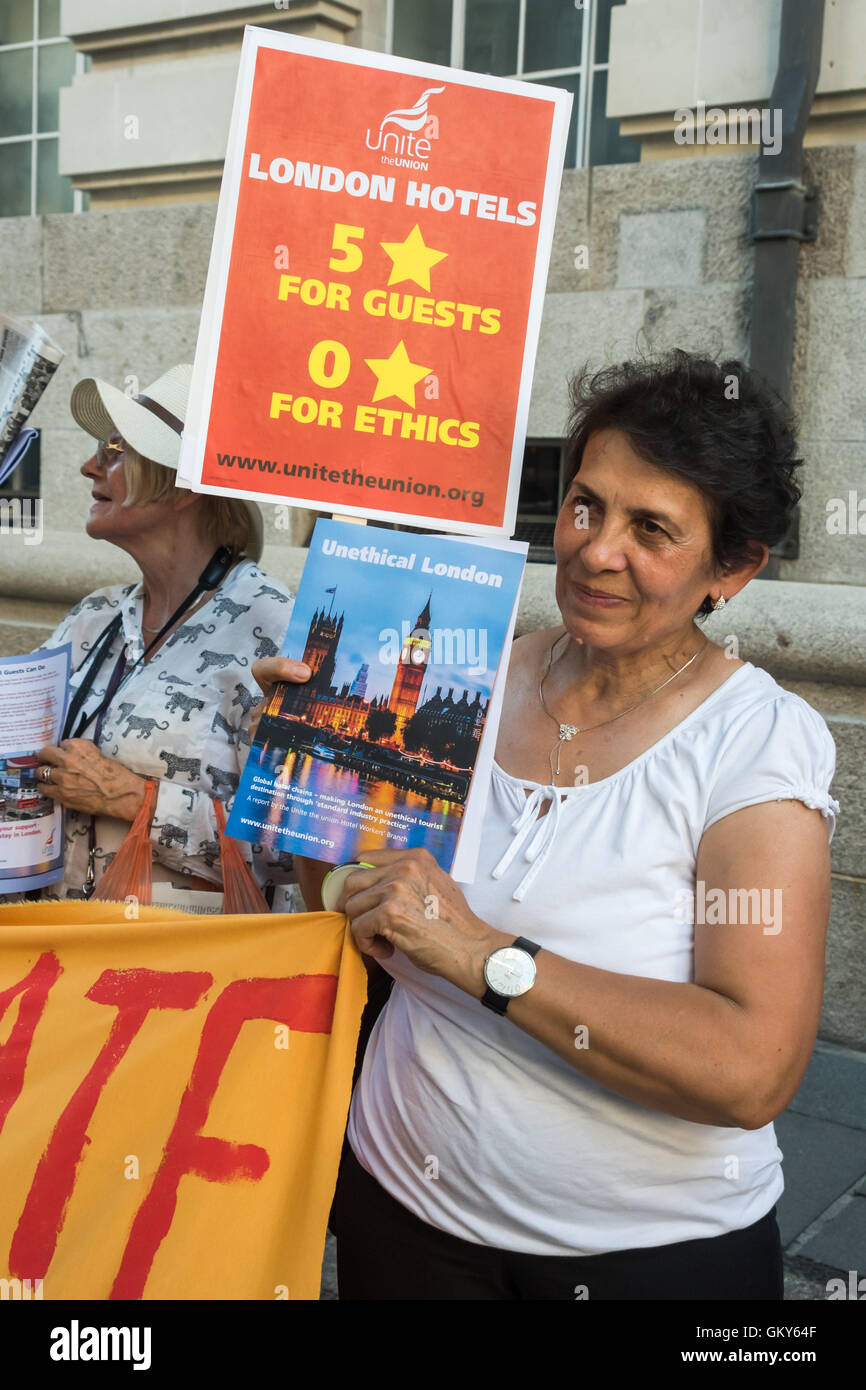 London, UK. August 23rd 2016. Unite Hospitality Workers launch their 'Unethical London' report into the bullying, harassment and victimisation of workers in London's top hotels, where management deny the right to join unions and bargain for better wages and conditions with a protest outside the Premier Inn at London County Hall. Two thirds of hospitality workers earn less than the London Living Wage. Peter Marshall/Alamy Live News Stock Photo