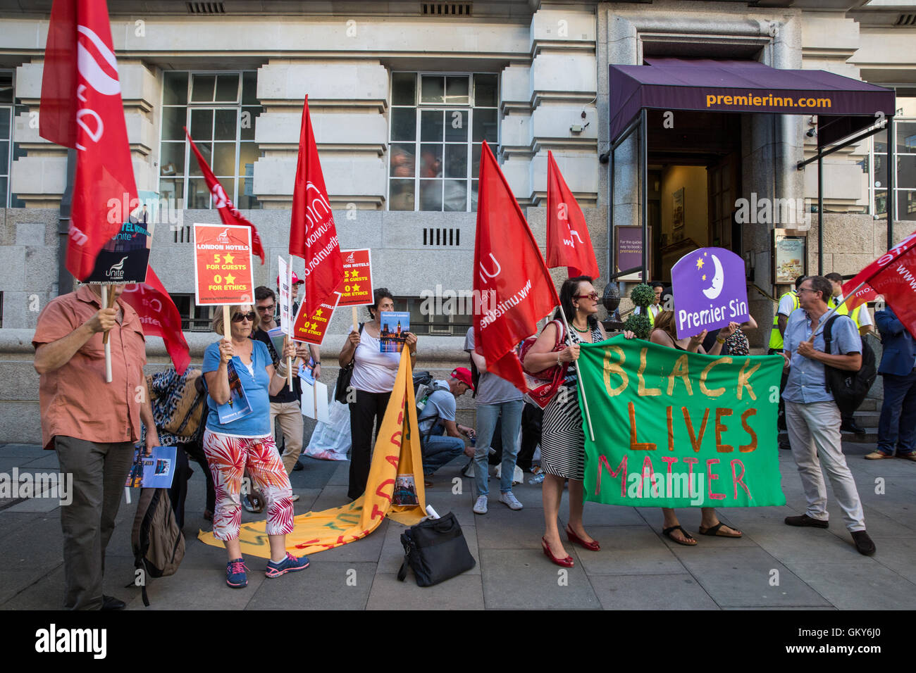 London, UK. 23rd August, 2016. Members of the Unite Hotel Workers Branch launch the Unethical London report, which details the manner in which workers at leading London hotels are denied access to the basic human rights of freedom of association and collective bargaining, at a protest outside the Premier Inn at County Hall. Two-thirds of hospitality workers earn less than the London Living Wage. Credit:  Mark Kerrison/Alamy Live News Stock Photo