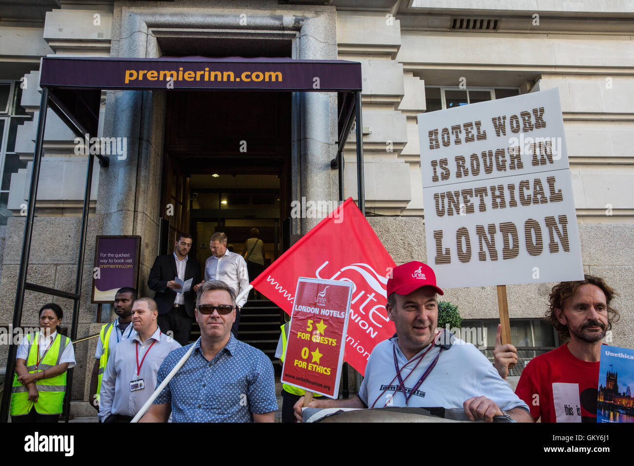 London, UK. 23rd August, 2016. Members of the Unite Hotel Workers Branch launch the Unethical London report, which details the manner in which workers at leading London hotels are denied access to the basic human rights of freedom of association and collective bargaining, at a protest outside the Premier Inn at County Hall. Two-thirds of hospitality workers earn less than the London Living Wage. Credit:  Mark Kerrison/Alamy Live News Stock Photo