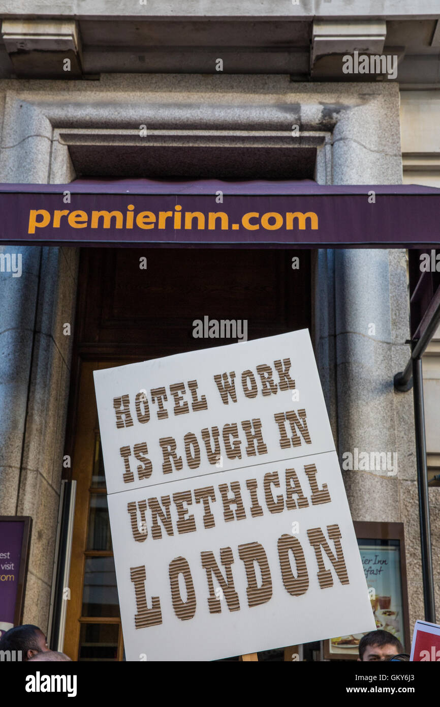 London, UK. 23rd August, 2016. A placard used by members of the Unite Hotel Workers Branch launching the Unethical London report, which details the manner in which workers at leading London hotels are denied access to the basic human rights of freedom of association and collective bargaining, at a protest outside the Premier Inn at County Hall. Two-thirds of hospitality workers earn less than the London Living Wage. Credit:  Mark Kerrison/Alamy Live News Stock Photo
