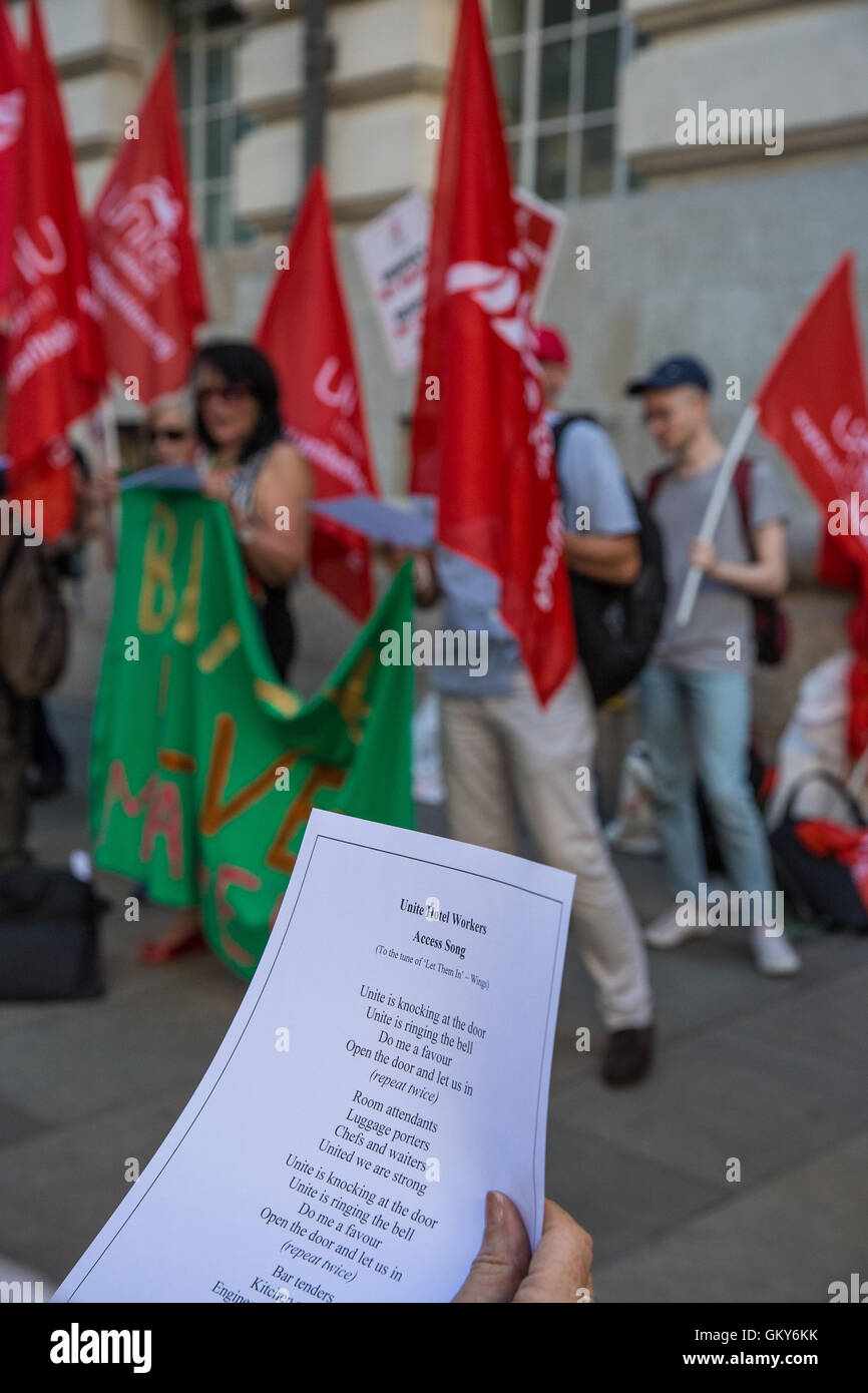 London, UK. 23rd August, 2016. Members of the Unite Hotel Workers Branch sing the 'Access Song' at the launch of the Unethical London report, which details the manner in which workers at leading London hotels are denied access to the basic human rights of freedom of association and collective bargaining, at a protest outside the Premier Inn at Country Hall. Two-thirds of hospitality workers earn less than the London Living Wage. Credit:  Mark Kerrison/Alamy Live News Stock Photo