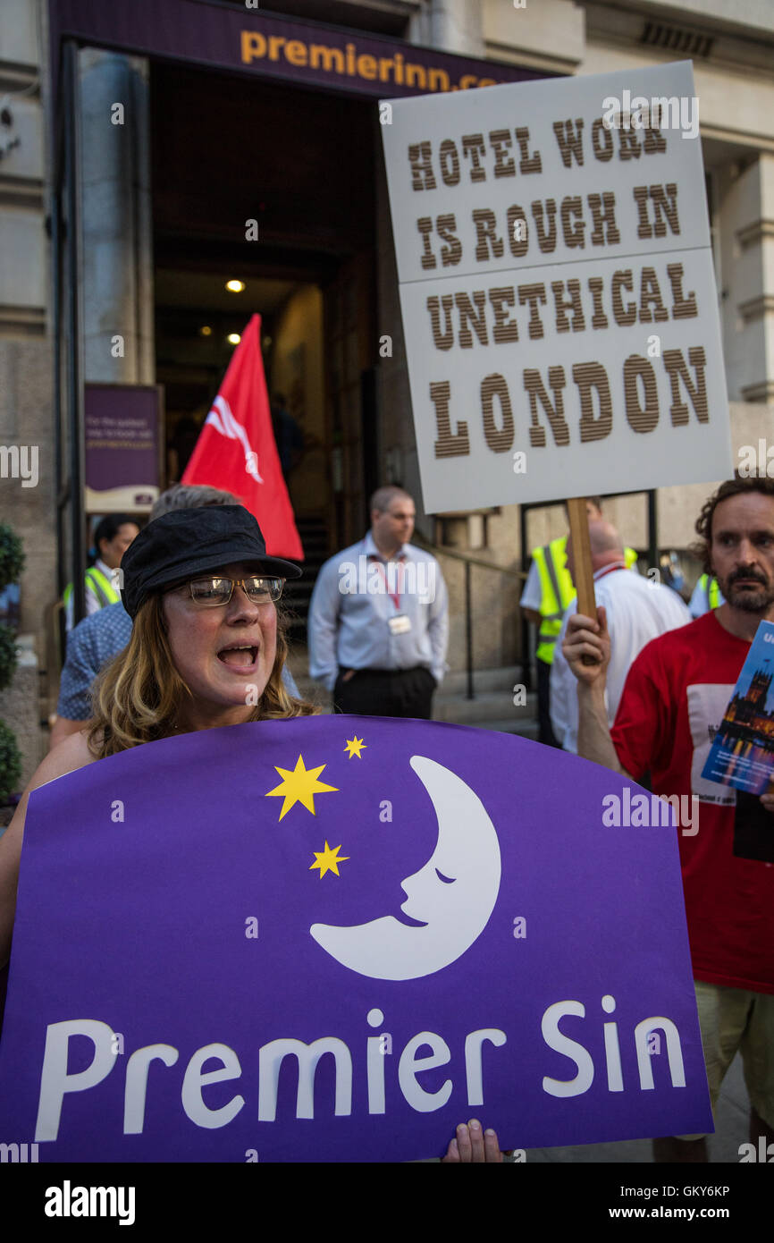 London, UK. 23rd August, 2016. Members and supporters of the Unite Hotel Workers Branch launch the Unethical London report, which details the manner in which workers at leading London hotels are denied access to the basic human rights of freedom of association and collective bargaining, at a protest outside the Premier Inn at County Hall. Two-thirds of hospitality workers earn less than the London Living Wage. Credit:  Mark Kerrison/Alamy Live News Stock Photo