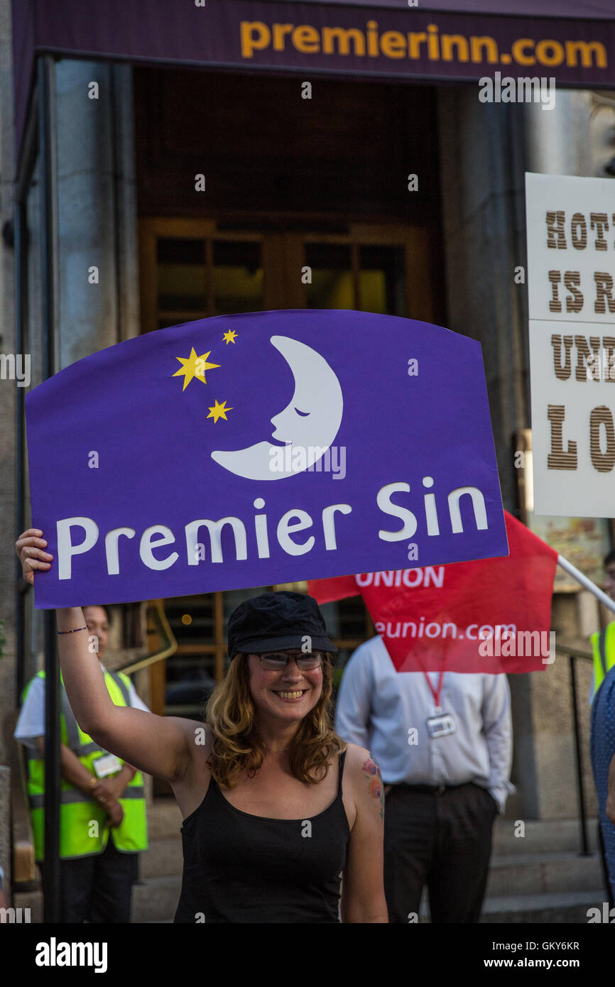 London, UK. 23rd August, 2016. A member of the Unite Hotel Workers Branch at the launch of the Unethical London report, which details the manner in which workers at leading London hotels are denied access to the basic human rights of freedom of association and collective bargaining, outside the Premier Inn at County Hall. Two-thirds of hospitality workers earn less than the London Living Wage. Credit:  Mark Kerrison/Alamy Live News Stock Photo