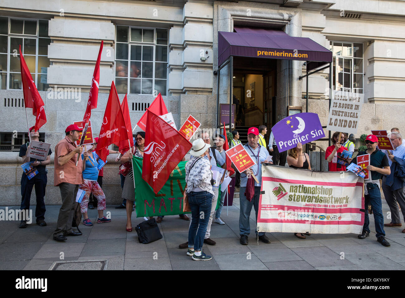 London, UK. 23rd August, 2016. Members of the Unite Hotel Workers Branch launch the Unethical London report, which details the manner in which workers at leading London hotels are denied access to the basic human rights of freedom of association and collective bargaining, at a protest outside the Premier Inn at County Hall. Two-thirds of hospitality workers earn less than the London Living Wage. Credit:  Mark Kerrison/Alamy Live News Stock Photo