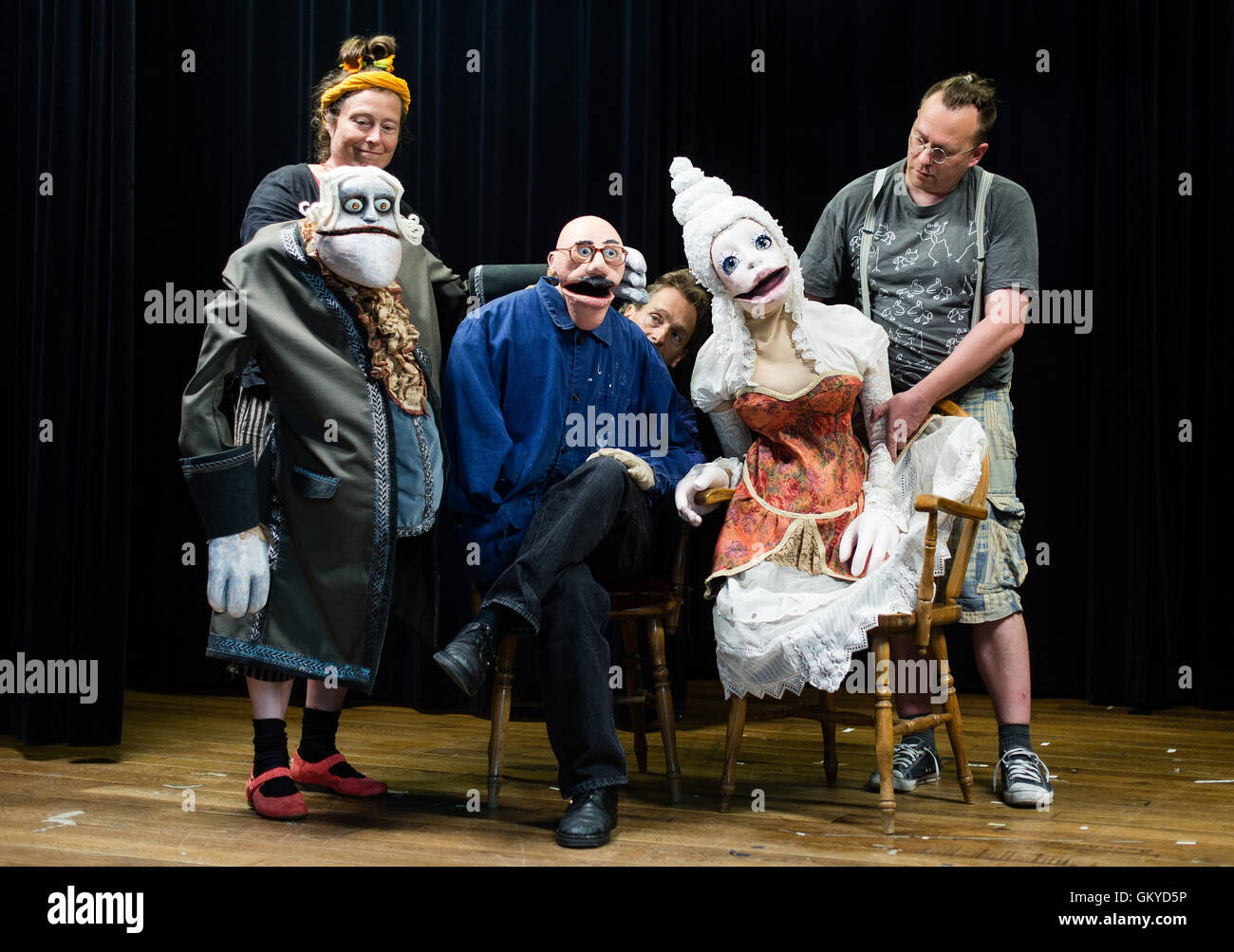 Northeim, Germany. 23rd Aug, 2016. The puppets Herr Heidegger (l-r), animated by Ruth Brockhausen, Herr Kasurke, animated by Heiko Brockhausen, and Mary, animated by Oliver Koehler at the Theatre der Nacht in Northeim, Germany, 23 August 2016. During a conference lasting from 29 August to 4 September 2016, puppeteers meet from all over Germany meet for courses, workshops and theater performances with different puppet types. Photo: Sebastian Gollnow/dpa/Alamy Live News Stock Photo