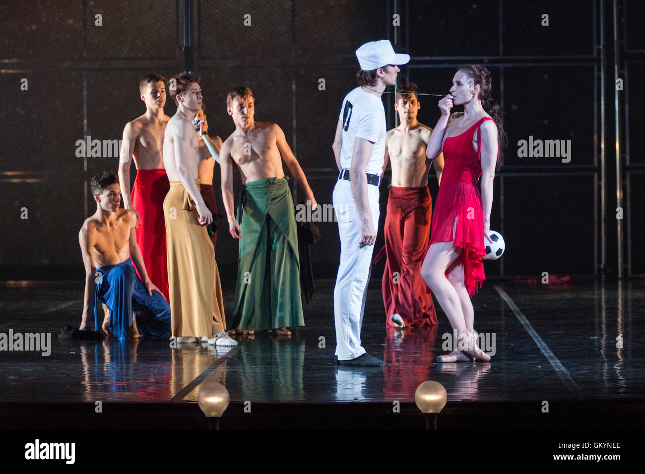 London, UK. 23 August 2016. Pictured: Irina Kolesnikova as Carmen (red dress). St Petersburg Ballet Theatre returns to the London Coliseum to present the World Premiere of Her Name Was Carmen starring Irina Kolesnikova from 23 to 28 August 2016. Choreography by Olga Kostel to music by Georges Bizet. Stock Photo