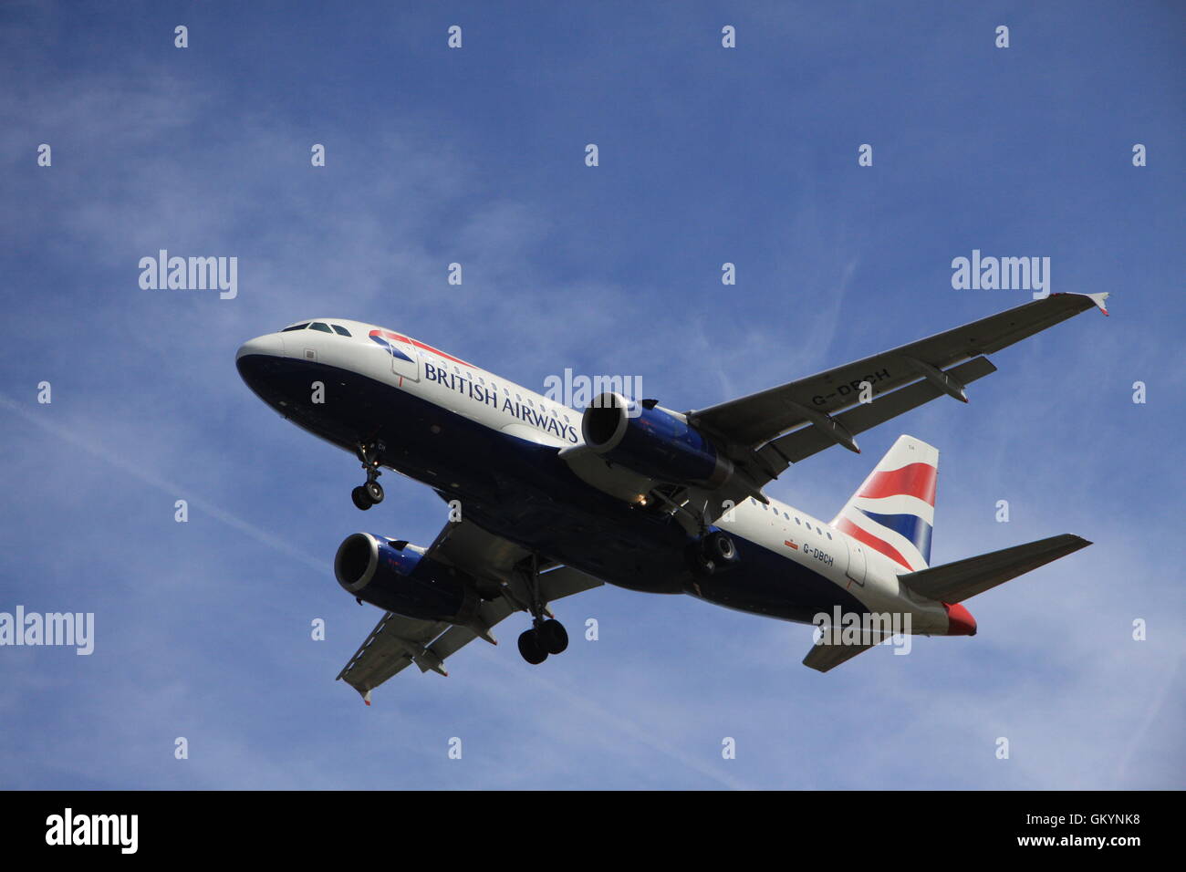 British Airways jet aircraft landing at London Heathrow Airport Stock Photo