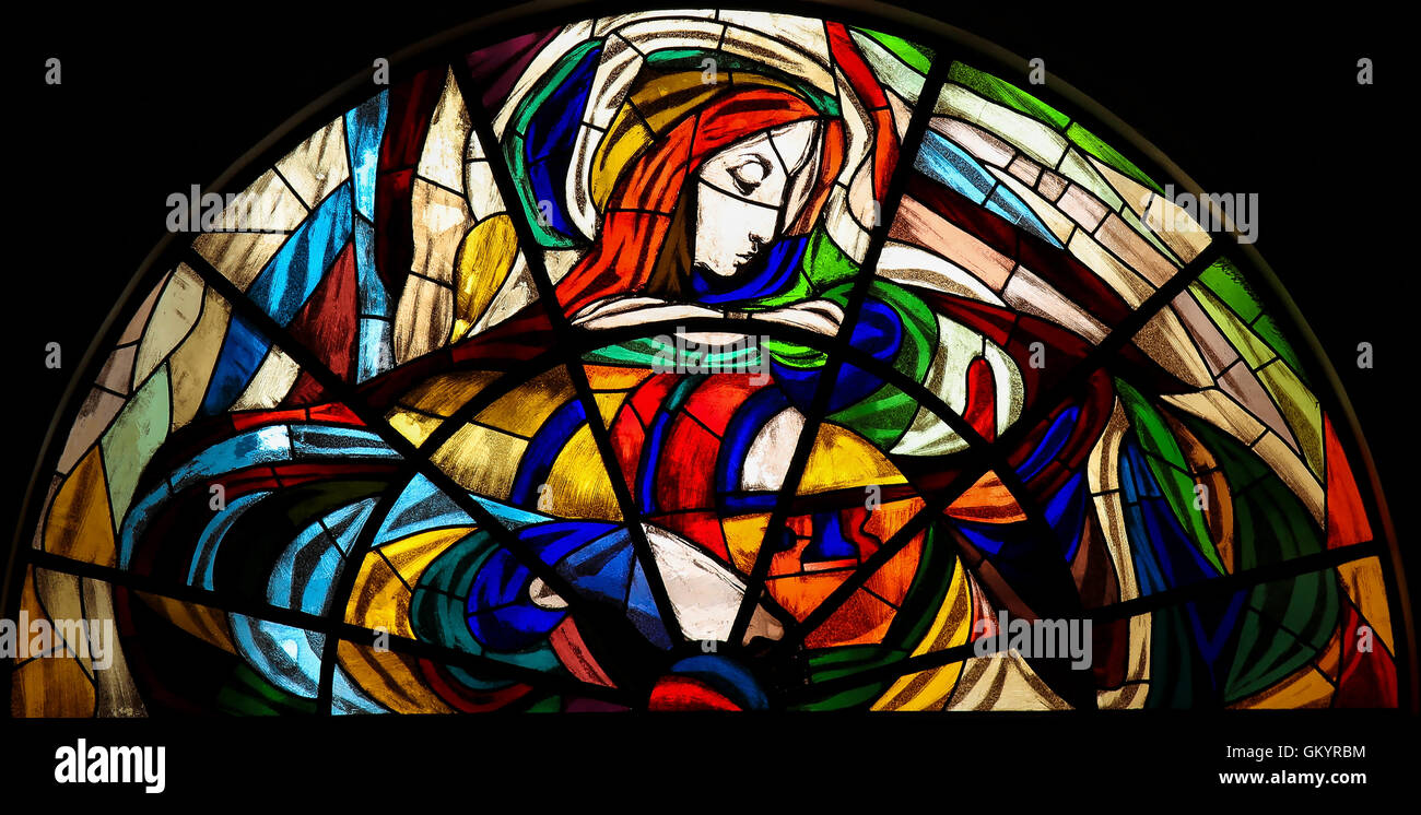 Stained Glass depicting the Apparition of Virgin Mary before the shepherd children at the Sanctuary of Fatima in Portugal. Stock Photo
