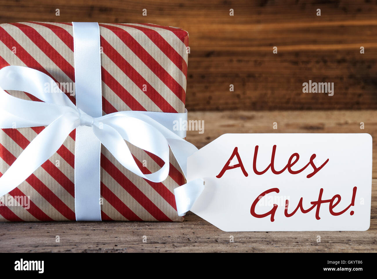 Present With Label, Alles Gute Means Best Wishes Stock Photo - Alamy