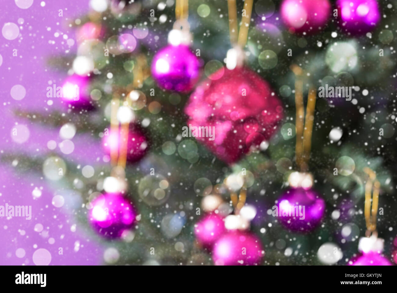 Blurry Christmas Tree With Rose Quartz Balls, Bokeh And Snowflakes Stock Photo