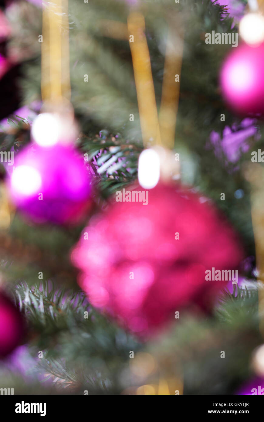 Vertical Blurry Christmas Tree With Rose Quartz Balls Stock Photo
