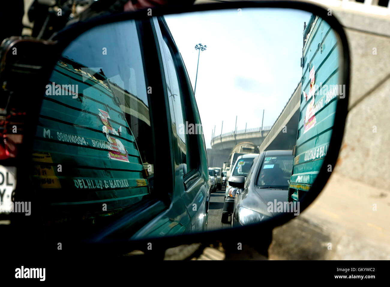 Seen through Back View Mirror Of Car Stock Photo