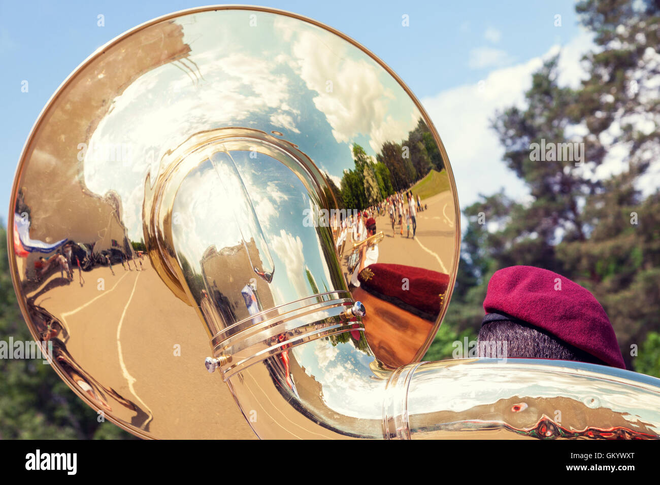 Detail of sousaphone played by military orchestra shot from behind Stock Photo