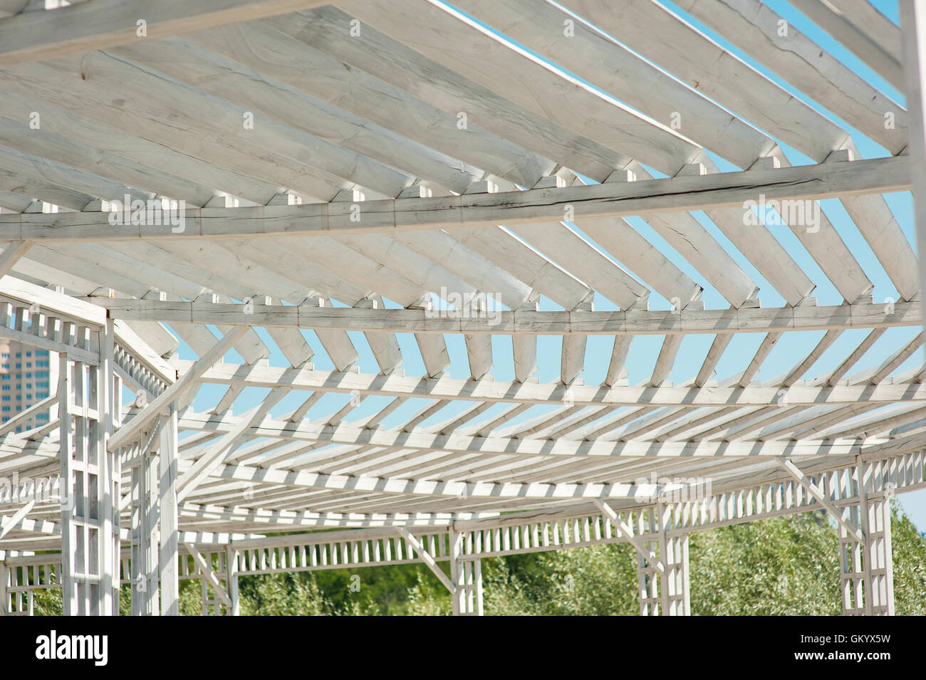 white gazebo in the park against blue sky Stock Photo - Alamy