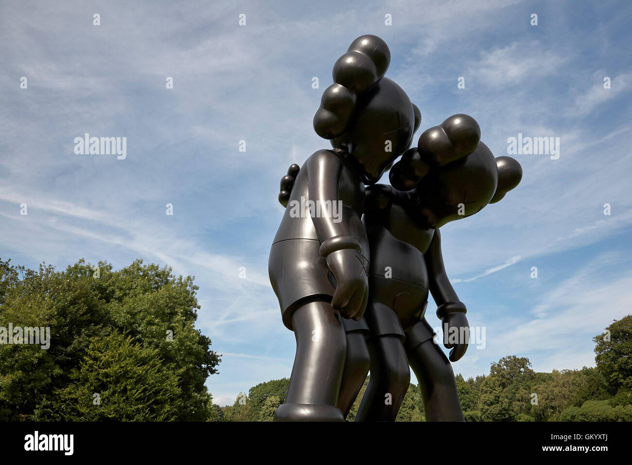 Kaws Along the Way black wooden sculpture in the Yorkshire 
