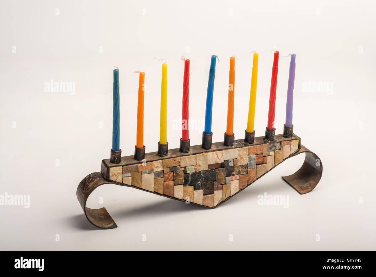 Menorah with candles for Hanukkah on white background Stock Photo