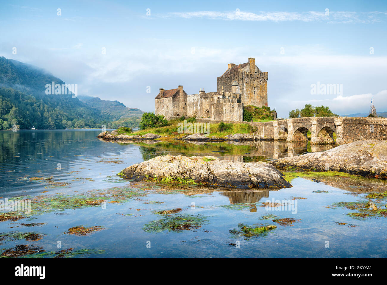 Early morning sunlight over Eilean Donan Castle at Kyle of Lochalsh in the Western Highlands of Scotland Stock Photo