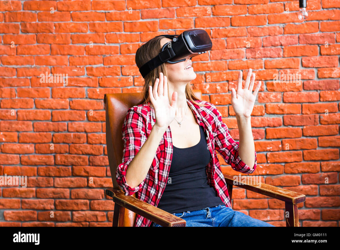 Young Woman Wearing Virtual Reality Headset Stock Photo - Alamy